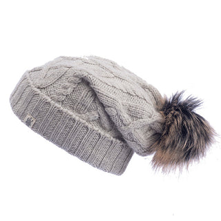 A grey Sugar Sugar Slouch with a faux fur pom pom.