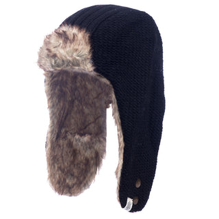 The Winter Trapper Hat is a cozy black accessory with a textured knit exterior, faux fur lining, and ear flaps. It features two snap buttons to secure the ear flaps, ensuring warmth during chilly days.