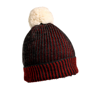 The Allen Pom Hat is a knitted winter beanie with red and black stripes, featuring a thick ribbed pattern and a white pom-pom on top, made from soft Merino Wool.