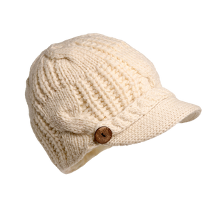 Introducing the Broadway Hat – a cream-colored, cable knit hat with a textured pattern and a short brim. This winter essential is adorned with a single wooden button on the side, making it as stylish as it is cozy.