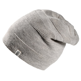 The Edgar Slouch is a light gray knit beanie with a folded brim and a small rectangular fabric logo tag on the side, shown against a white background.