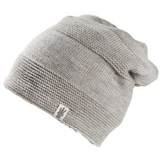 The Edgar Slouch is a light gray knitted beanie with a slouchy fit, featuring a small rectangular tag with text and logo on the brim. It is displayed against a white background.