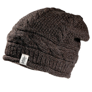 The Gateway Hat is a dark brown beanie with a cable knit pattern and a small white tag featuring a black logo, shown against a white background.