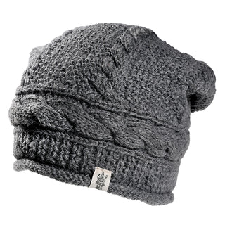 The Gateway Hat is a gray knitted beanie with a thick, textured cable pattern and a small fabric logo tag on the brim.