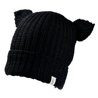 The Charlie Hat is a black ribbed knit beanie with two cat ear-shaped points on top and a small white tag on the folded brim, shown against a plain white background.
