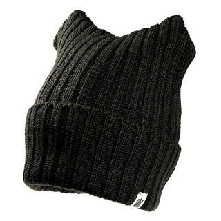 The Ely Hat is a black ribbed knit beanie with two pointed corners like cat ears and a small white fabric tag on the brim.