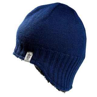 The Dakota Hat is a blue knitted beanie featuring a ribbed edge and a small white tag near the brim, displayed against a white background.