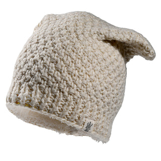 The Bear Ear Beanie is a cream-colored, chunky knit hat with a slouchy fit and a small fabric tag at the bottom edge, shown against a white background.