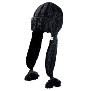 The Alex Hat is a black knit winter hat featuring long ear flaps and large tassels at the ends, photographed against a white background.