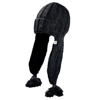 The Alex Hat is a dark knit winter hat featuring two long ear flaps and tassels at the ends, shown against a white background.