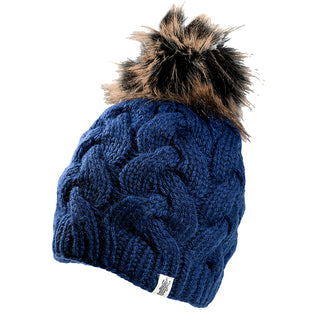 The Boheme Cable Beanie w/ Faux Fur Pom, a cozy blue wool hat with large cable patterns and a brown faux fur pom-pom, handmade in Nepal, is displayed against a white background.