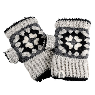 The Ryan Handwarmers are crochet fingerless gloves in gray, black, and white with a square flower pattern and ribbed cuffs, shown laid flat on a white background.
