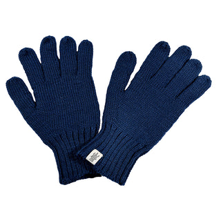The McCarren Gloves are dark blue men's knitted gloves with a ribbed cuff, crafted from soft Merino wool. A small white label sits near the wrist. Perfect for winter, these gloves are shown laid flat on a white background.