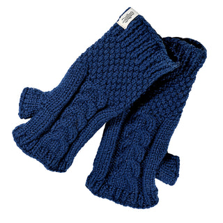 A pair of navy blue Cable Handwarmers made from wool with a textured cable pattern and a small white cuff label are shown overlapping on a white background.