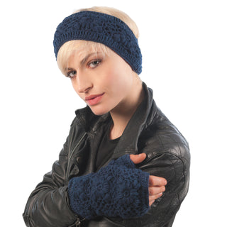 A woman wearing a Flower Crochet Headband- SOLIDS with fleece lining.