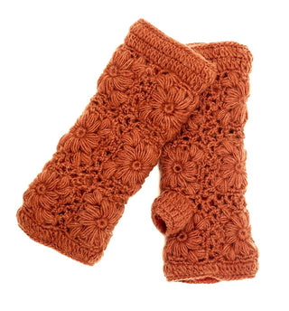 Two rust-colored Flower Crochet Handwarmers with a floral crochet pattern are stacked on a white background. Each fingerless glove has a thumb opening and textured design—perfect winter hand warmers for women.