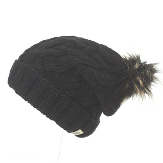 A handmade Sugar Sugar Slouch with a faux fur pom.