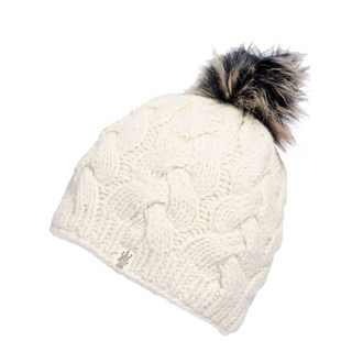 The Boheme Cable Beanie w/ Faux Fur Pom is a white, knitted winter hat showcasing a chunky cable-knit design and topped with a large, multicolored faux fur pom-pom. Crafted from 100% Merino Wool, it features a small tag with an indistinct symbol sewn near the bottom edge.