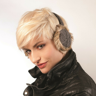 A person with short blonde hair is wearing a black leather jacket and Cable Knit Adjustable Earmuffs With Faux Fur in gray. The individual is slightly smiling and looking towards the camera against a plain white background.