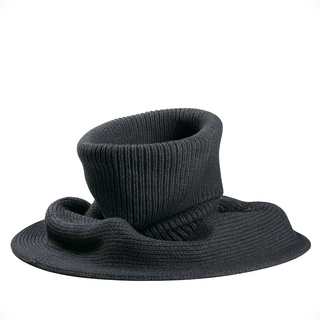 The Hank Neckwarmer is a black knitted accessory with a unique, abstract shape, featuring soft folds, a wide ribbed pattern, and an asymmetrical design for added style.