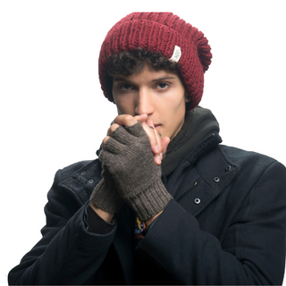 A man in a black jacket and Striped and Solid Fingerless Gloves.