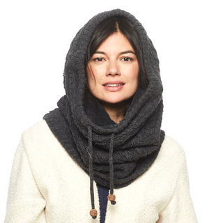 A woman wearing a grey merino wool Lou Neckwarmer.