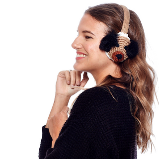 A woman wearing Crochet Dog Earmuffs.