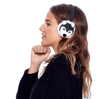 A woman wearing Wolf Earmuffs.