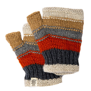 The Short Cuff Handwarmers showcase multicolor stripes in beige, brown, gray, orange, and navy overlapping each other against a white background. Handmade from wool, these fingerless knitted gloves feature a small woven tag with an illustration at the bottom corner.
