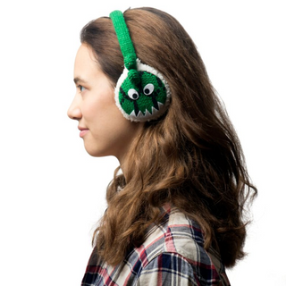 A woman wearing Dinosaur Earmuffs.